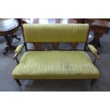 An Edward VII inlaid rosewood and upholstered salon settee