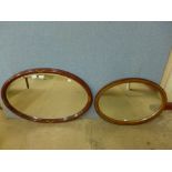A Victorian oval inlaid rosewood mirror and a mahogany mirror