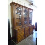 A George III style walnut library bookcase