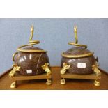 A pair of French style ormolu and marble orb shaped centrepieces surmounted with serpents