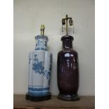 A Chinese style table lamp and an amethyst glass table lamp