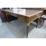 A French Louis XV style mahogany, rosewood effect and gilt metal mounted bureau plat