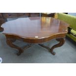 A Victorian carved mahogany centre table