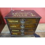 A small 19th Century beech haberdashery shop cabinet, bearing Clark & Co. Anchor Mills inscription