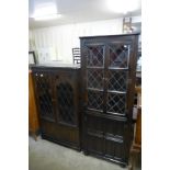 An oak freestanding corner cabinet and an oak two door bookcase