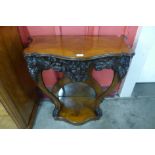 A 19th Century Baroque Revival carved walnut console table