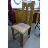 An Arts and Crafts oak side chair