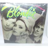 An autographed Blondie LP record, Eat to the Beat by Debbie Harry