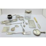 Silver items including napkin rings, fobs, salt spoons, small mirror, a Victorian fork, tray, two