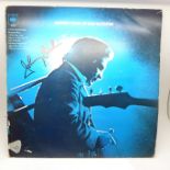 An autographed Johnny Cash at San Quentin LP record