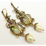 A pair of scarab drop earrings