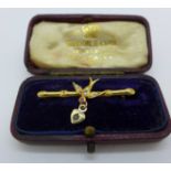 A 9ct gold, pearl, ruby and diamond bird brooch in a fitted case, 1.3g