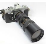 A Praktica MTL3 camera case with Optomax f3.8 85-205mm zoom lens
