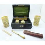 A collection of carved ivory and bone