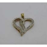 A 9ct gold and diamond heart shaped pendant, 1.8g