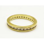 An 18ct gold eternity ring, 3.5g, N