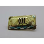 A Norwegian silver gilt and enamel Viking ship brooch, Gustav Gaudernack, 20mm