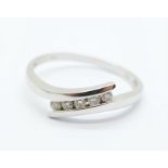 A 9ct white gold and diamond ring, 2.2g, S