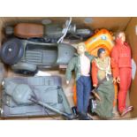 Two Action Man figures, one other similar action figure, a motorcycle, a tank and a dinghy