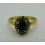 An 18ct gold, diamond and sapphire ring, 3.6g, L