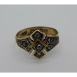 A 9ct gold ring set with five old cut diamonds, enamel a/f, 3.6g, P