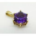 A 9ct gold and purple stone pendant, 1.9g