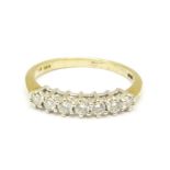 A 9ct gold, seven stone diamond ring, 2.4g, R