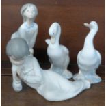 A Lladro figure and three Nao figures