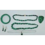 Assorted malachite jewellery, two necklaces, a bangle, earrings, a pendant and chain and a pendant