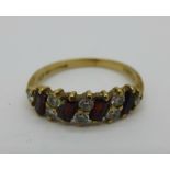 A 9ct gold, red and white stone ring, 2g, M