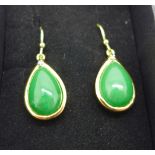A pair of silver gilt, jade and diamond earrings