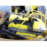 Two boxes of Tonka Toys trucks, cranes and bulldozers