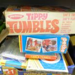 A collection of toys and games including Victory jigsaws, Tippy Tumblers, etc.