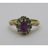 A 9ct gold, purple stone and diamond cluster ring, 2.5g, N
