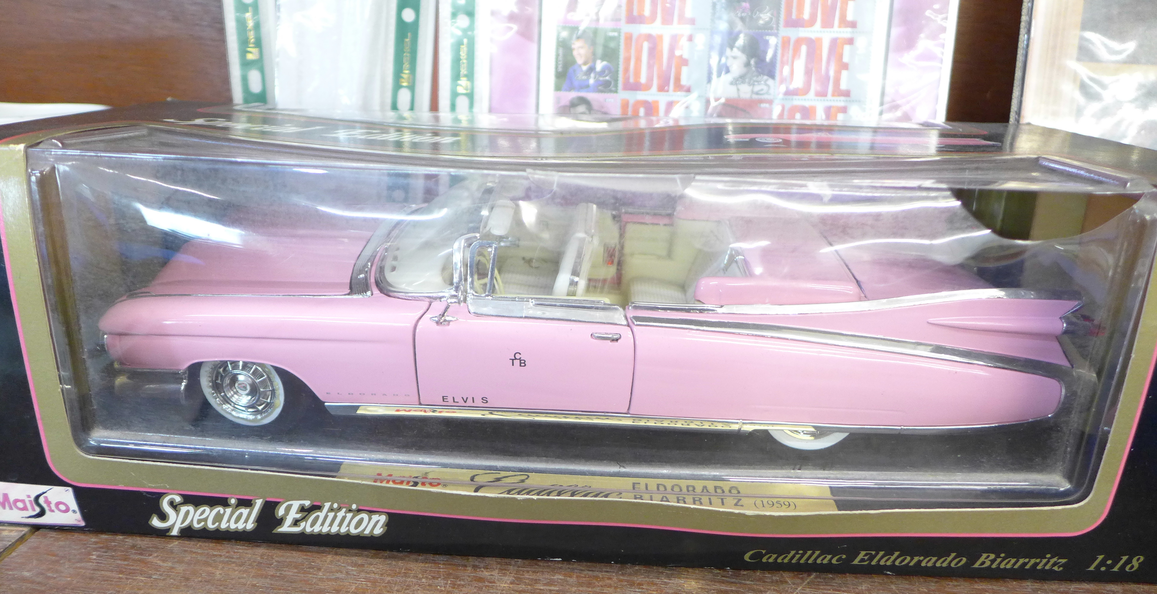 A Maisto model Cadillac in pink, Eldorado Biarritz, 1959, boxed and a collection of four Elvis
