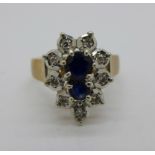 A 9ct gold, sapphire and diamond flower ring, 3.9g, L
