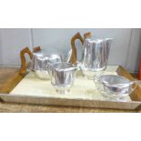 A four piece Picquot Ware tea service and tray