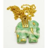 A jade elephant pendant and chain