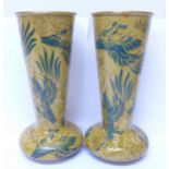 A pair of Doulton Lambeth Art Nouveau vases, circa 1890-1900, decorated with phoenix in foliage,