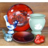 A Royal Doulton flambe plate, pin dish and seated duck, a Wedgwood urn, a Soholm, Denmark bird and
