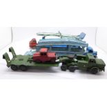 Three Dinky Toys die-cast model vehicles and a Corgi car transporter