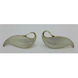 A pair of Norwegian silver gilt white enamel screw back earrings