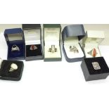 Seven silver rings, boxed