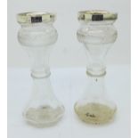 A pair of cut glass and silver mounted vases, 13cm