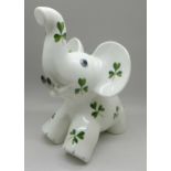 A Plichta/Wemyss elephant with shamrock decoration, a/f (one tusk and hairline on back leg)