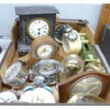 A box of assorted clocks