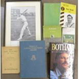 A signed Ian Botham book, a signed Reg Simpson book and other cricket books and a cricket print