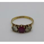 A 9ct gold, three stone ring, 1.9g, N