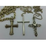 Three silver cross pendants with chains, 33g