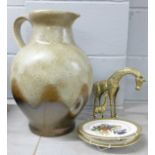 A large German jug, plates and brass animals